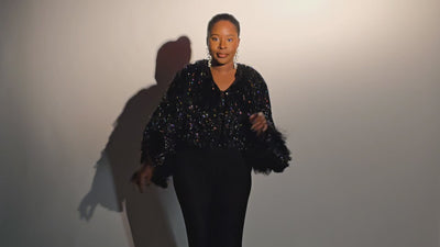 Video of two models dancing in Genesis Jacket